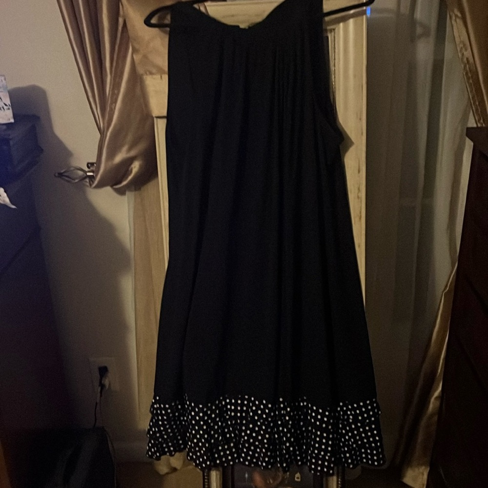 Black dress with bottom white polka dots.